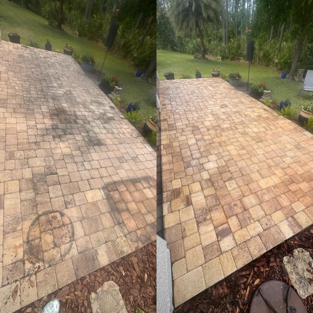 Before and after comparison of a dirty stone patio transformed by professional pressure washing.